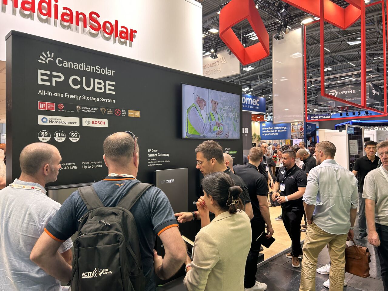 Visitors gather at EP Cube booth at Intersolar Europe 2026 trade show viewing energy storage system display under Canadian Solar branding